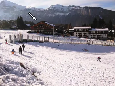 a group of people standing in the snow at Charmant 2 pièces avec WIFI et 4 couchages à Le Pernant - FR-1-836-16 in Arâches-la-Frasse
