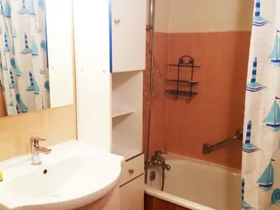 a bathroom with a sink and a toilet and a shower at Appartement 2 chambres - 6 pers - Centre station - FR-1-836-17 in Arâches-la-Frasse