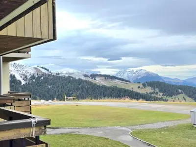 a view of a river and mountains from a house at Appartement Samoëns 1600 in Samoëns