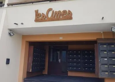 a building with a sign that reads bc time at Appartement Samoëns 1600 in Samoëns