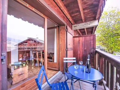 a town in the mountains with snow on the ground at Studio Les Grets-13 by Interhome in Saint-Gervais-les-Bains