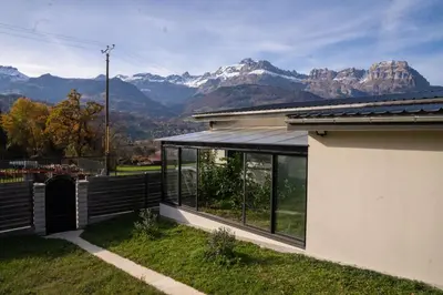 a house with a view of mountains at Maison nature, ski, randos in Passy