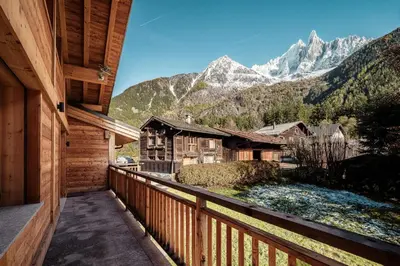 a balcony with a view of a mountain at Chalet Mont Plaisir - Au pied des Drus in Chamonix-Mont-Blanc