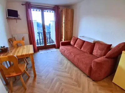 a room with two bunk beds in a room at Studio SnowCarroz with a view for 4 people in Arâches-la-Frasse