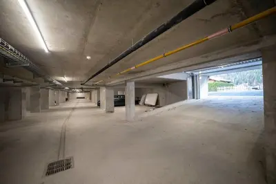 an empty parking lot in a building under construction at Cosmiques A203 - New & Mont Blanc view in Les Houches