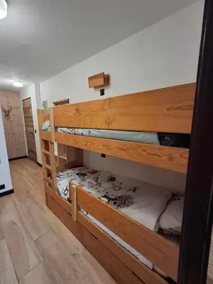 a room with two bunk beds in a room at Armancette B7 in Les Contamines-Montjoie