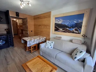 a living room with a couch and a table at Armancette B7 in Les Contamines-Montjoie
