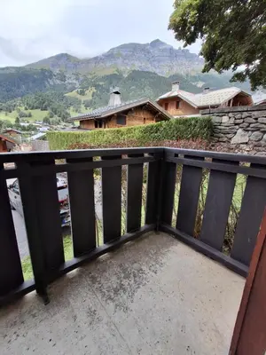 a balcony with a view of a house at Armancette B7 in Les Contamines-Montjoie