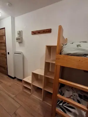 a small room with a bunk bed and a closet at Armancette B7 in Les Contamines-Montjoie