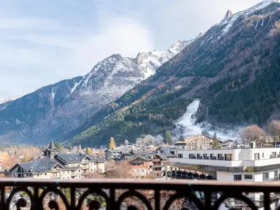 a view of a town in the mountains at Diamond - Hyper Central 2 Bedrooms - Magnificent Views - By Cozee Rentals in Chamonix-Mont-Blanc