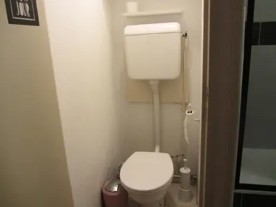 a small bathroom with a white toilet in it at Résidence L'enclave - Enclave I599 MAE-9743 in Les Contamines-Montjoie