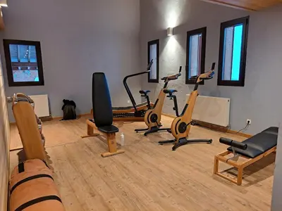 a gym with exercise bikes in a room at Spacieux appartement 96 m² à Flaine Hameau avec piscine et parking - FR-1-687-119 in Arâches-la-Frasse