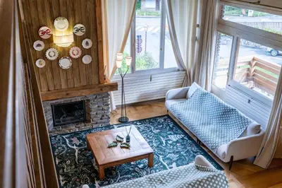 a living room with a couch and a fireplace at Spacious Apartment 4BR 10P Megève Center in Megève