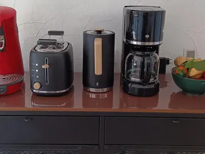 a counter with two toasters and a blender on it at Studio 4 pers, cuisine équipée, parking privé, non-fumeur - FR-1-836-43 in Arâches-la-Frasse
