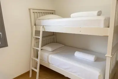 a couple of bunk beds in a room at Stay in a modern apartment in Chamonix in Chamonix-Mont-Blanc