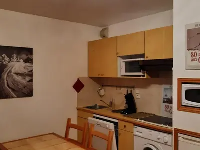 a small kitchen with a sink and a microwave at Studio cosy avec terrasse, 4 pers, parking privatif - FR-1-836-35 in Arâches-la-Frasse