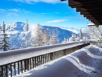 a bedroom with a bed in a log cabin at Chalet cosy avec jacuzzi, billard, wifi et animaux admis pour 8 personnes - FR-1-836-32 in Arâches-la-Frasse