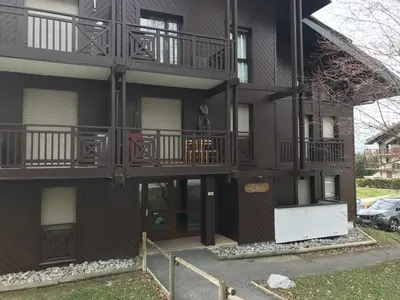 a building with balconies on the side of it at Appartement 2 pièces au pied de la télécabine avec animaux admis et parking - FR-1-836-30 in Arâches-la-Frasse