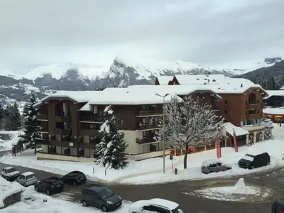 an aerial view of a village with buildings and trees at Studio à Morillon pour 4 pers. proche pistes et commerces - FR-1-815-105 in Morillon