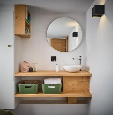 a bathroom with a sink and a mirror at Chalet Juno - Chamonix All Year in Chamonix-Mont-Blanc