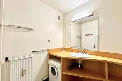 a bathroom with a sink and a mirror at Superb apartment in Megève in Megève