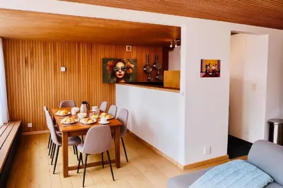 a dining room with a table and chairs at Bright apartment for 6 people in Chamonix in Chamonix-Mont-Blanc