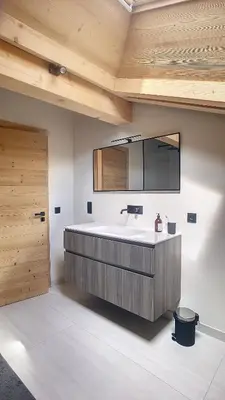 a large bathroom with a large tub and a sink at Chalet des Pres- 3 chambres - JAILLET - in Demi-Quartier