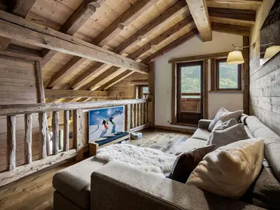 a bathroom with a tub and a sink and a mirror at Chalet à Saint-Gervais-les-Bains, 11 pers, sauna, Wi-Fi, parking - FR-1-663-59 in Saint-Gervais-les-Bains