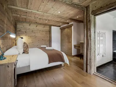 a bathroom with wooden ceilings and a sink and a tub at Chalet à Saint-Gervais-les-Bains, 11 pers, sauna, Wi-Fi, parking - FR-1-663-59 in Saint-Gervais-les-Bains