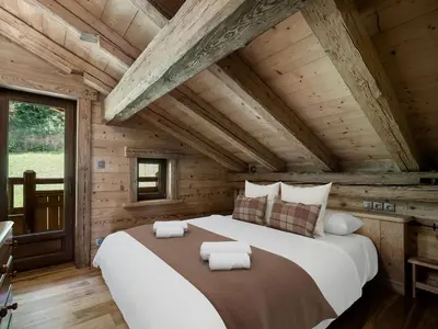 a wooden elevator in a room with wooden walls at Chalet à Saint-Gervais-les-Bains, 11 pers, sauna, Wi-Fi, parking - FR-1-663-59 in Saint-Gervais-les-Bains