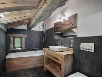 a living room with a couch and a fireplace at Chalet à Saint-Gervais-les-Bains, 11 pers, sauna, Wi-Fi, parking - FR-1-663-59 in Saint-Gervais-les-Bains