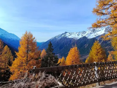 a view of the mountains from a wooden bridge at La Tanière des Cimes, sauna privé in Passy