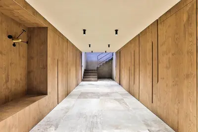 a hallway with wooden walls and a staircase at Chalet onthe Rocks in Chamonix-Mont-Blanc
