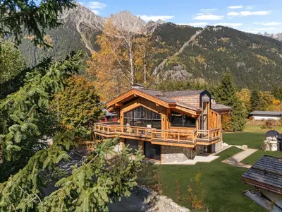 a large wooden house in the mountains at Chalet Rémond - Vue Montagnes in Chamonix-Mont-Blanc