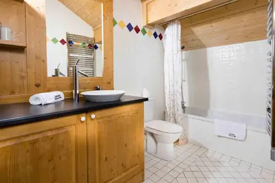 a bathroom with a sink and a toilet at Les Sonnailles Apartment - Chamonix All Year in Chamonix-Mont-Blanc