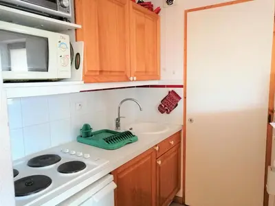 a bathroom with a glass wine rack next to a sink at Appartement 3 pièces, 6 personnes, au pied des pistes - Morillon 1100 - FR-1-815-103 in Morillon