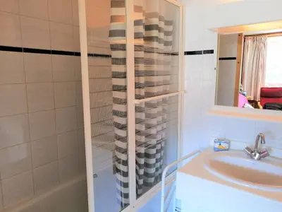 a kitchen and dining room with a table and chairs at Appartement 3 pièces, 6 personnes, au pied des pistes - Morillon 1100 - FR-1-815-103 in Morillon