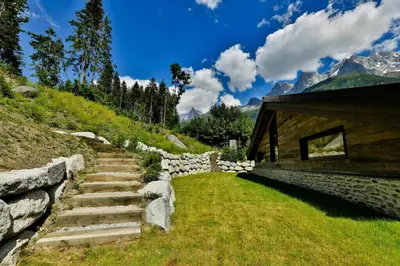 a stone stairway leading up to a building at Sumptuous Chalet In Chamonix-Mont-Blanc in Chamonix-Mont-Blanc