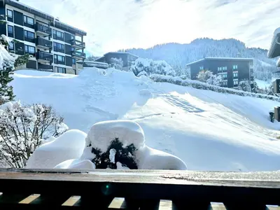 a pile of snow sitting on top of a street at Charming sunny duplex in Megève