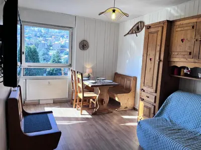 a small bedroom with a bed with pillows on it at Résidence Castel Des Roches C - CASTEL DES ROCHES C57 MAE-3063 in Saint-Gervais-les-Bains
