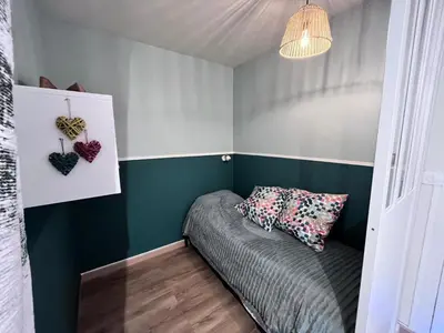 a room with a desk and a table and windows at Résidence Castel Des Roches C - CASTEL DES ROCHES C57 MAE-3063 in Saint-Gervais-les-Bains