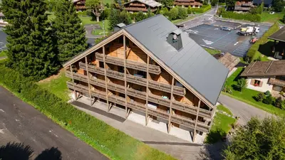 an overhead view of a large building with a roof at 1BDR 4P apartment with balcony and parking- Megève in Megève