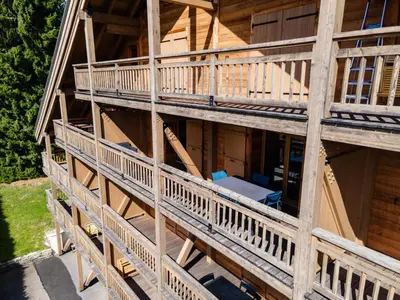 an overhead view of a house with decks at 1BDR 4P apartment with balcony and parking- Megève in Megève