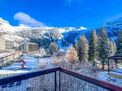 a view from a balcony of a snow covered mountain at Grand studio Flaine Forum vue montagne in Flaine