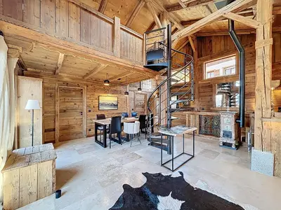a bedroom with a bed and a large window at Chalet 5 chambres + dortoir proche pistes Combloux - FR-1-560-173 in Combloux