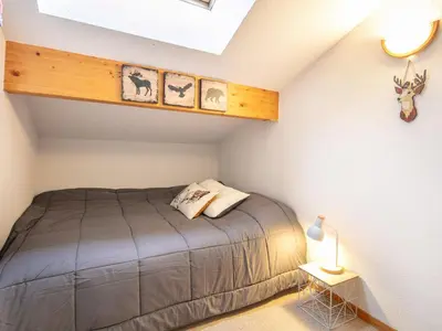 a bedroom with a bed in a attic at Gelinotte N51 4P6 in Morillon