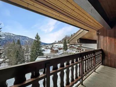 a balcony with a view of a snow covered mountain at NAN116 - Duplex 4-6 pers face a la telecabine in Les Carroz d'Araches