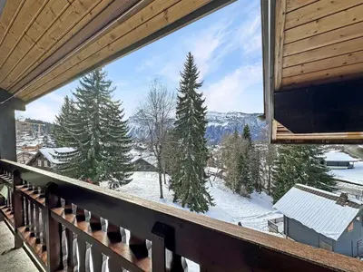 a balcony with a view of a snow covered mountain at NAN116 - Duplex 4-6 pers face a la telecabine in Les Carroz d'Araches