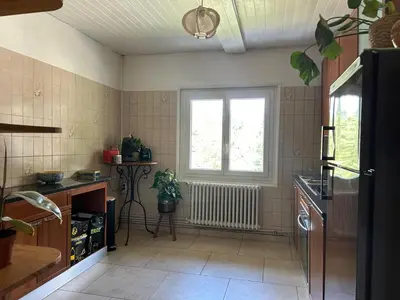 a kitchen with a sink and a window at La Flégère YourHostHelper in Chamonix-Mont-Blanc