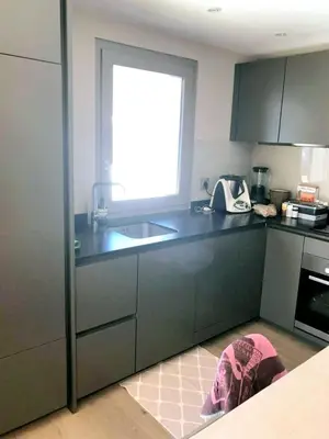 a bathroom with a sink and a bath tub at Apartment with large terace next Jaillet ski area in Megève